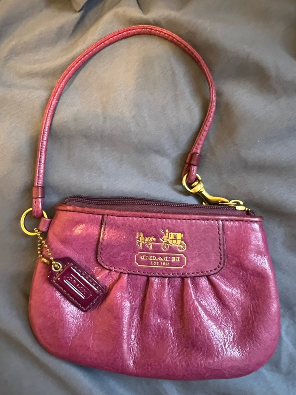 Stunning Coach Pink Leather Wristlet with Gold Accents